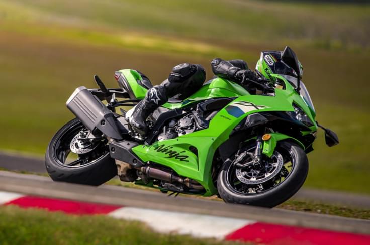 In terms of electronic aids, it gets dual-channel ABS, 3-levels of traction control and 3 power modes. 2026 Kawasaki Ninja ZX-6R left cornering shot